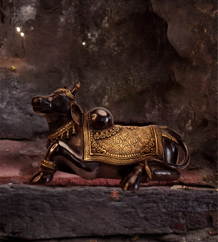 A traditional dual tone finish brass Nandhi idol available at Bharathiyam House Of Handicrafts in Coimbatore.