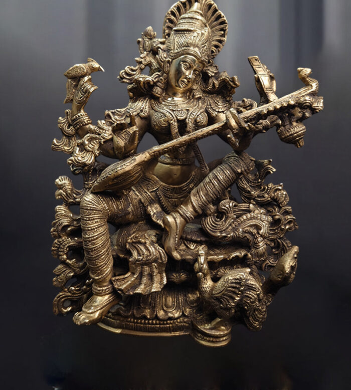 A beautifully handcrafted brass Saraswathy goddess idol available at Bharathiyam House Of Handicrafts in Coimbatore.