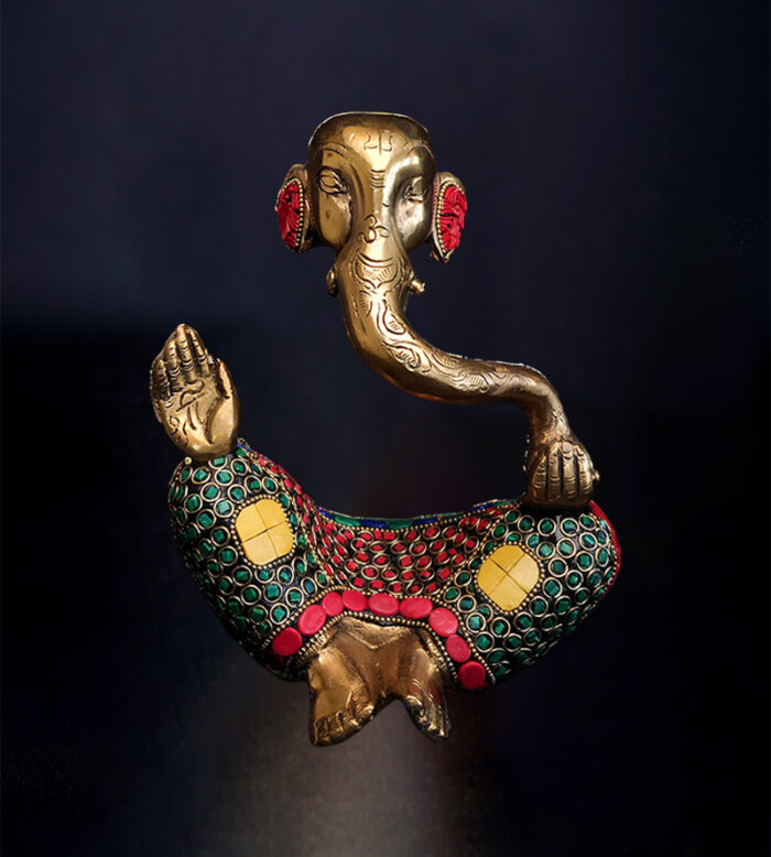 A unique handcrafted brass abstract Ganesha idol with stone work detailing, available at Bharathiyam in Coimbatore.