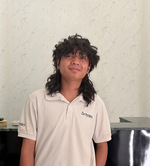 Hair stylist Prasib cutting hair in salon